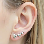 Brincos Ear Cuff Quatro Corações em Prata 925