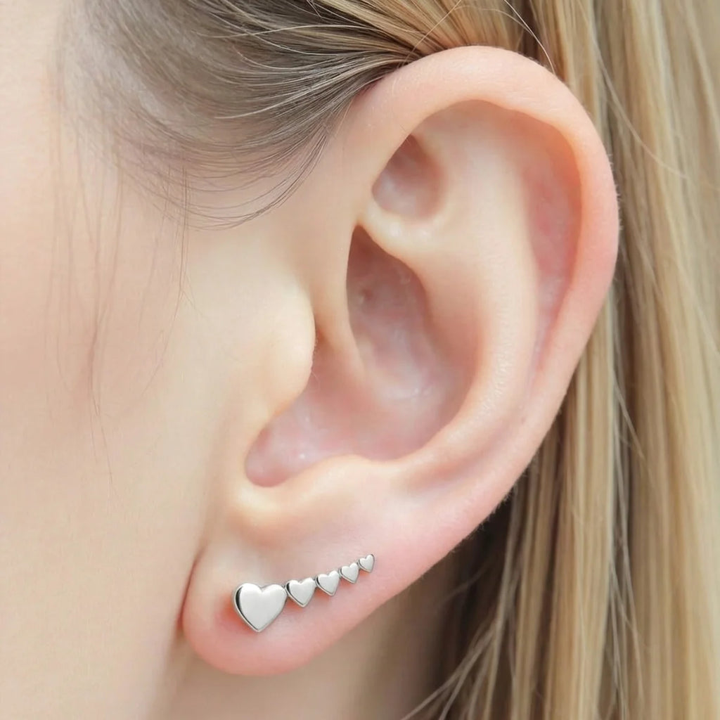Brincos Ear Cuff Quatro Corações em Prata 925
